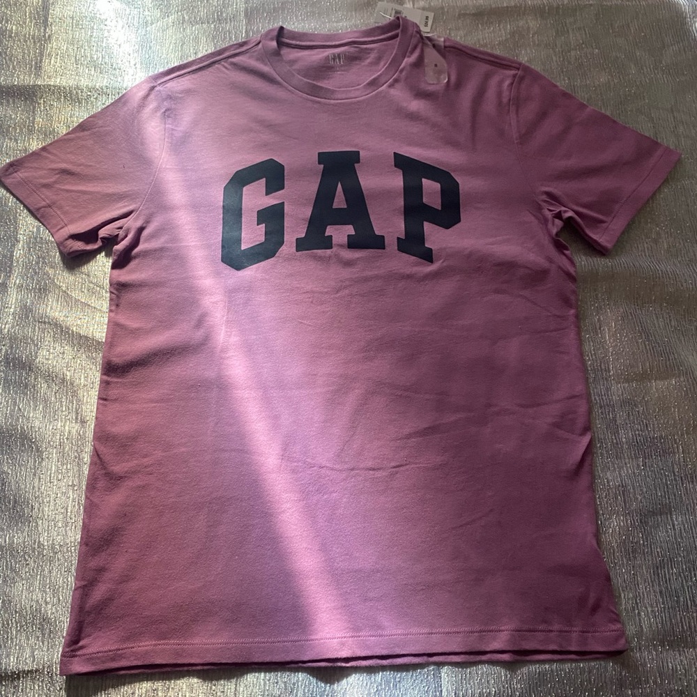 This is a Gap shirt in size small in color purple and black.